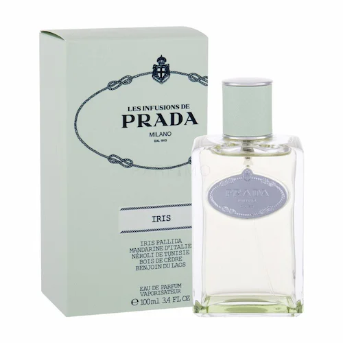 Sophisticated Infusion d'Iris by Prada perfume bottle, with its classic, clean lines and pale blue color, embodying timeless elegance in woody perfumes.